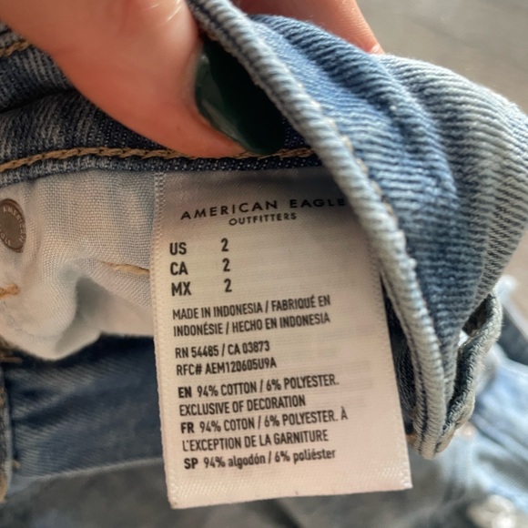 MEDIUM WASH AMERICAN EAGLE HIGH WAISTED DISTRESSED COMFORT STRETCH DENIM SHORTS - Picture 3 of 4